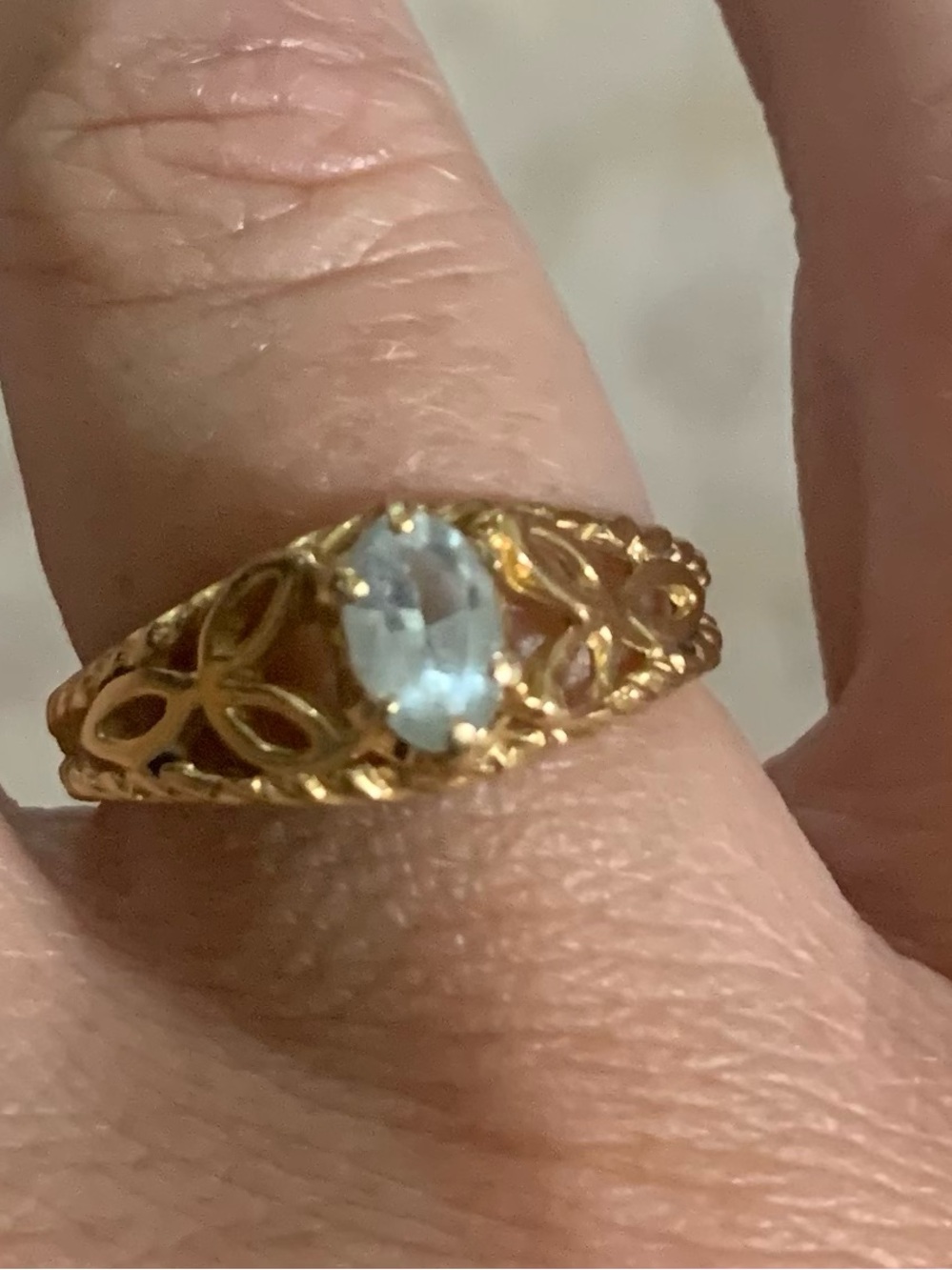 Gold Filigree Ring with Light Blue Oval Gemstone